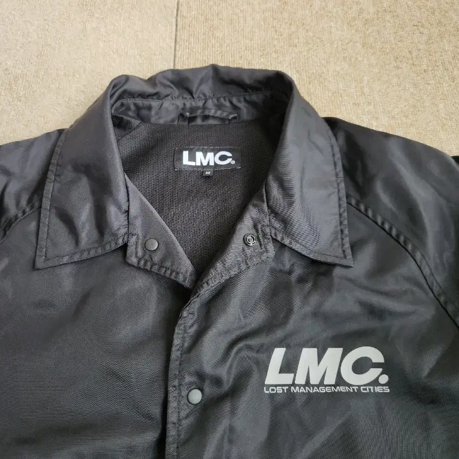 lmc 빅로고 바람막이 자켓