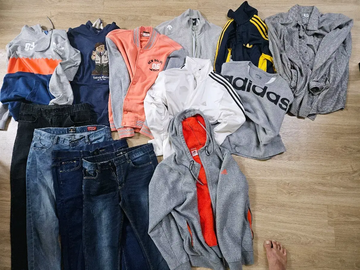 Selling a bunch of hoodies, jerseys, and jeans for cheap due to a move