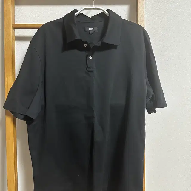 DKNY 22SS 블랙 면혼방 반팔카라티(105)