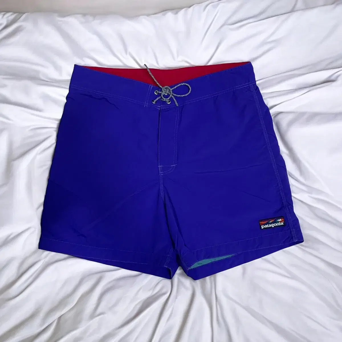 Patagonia river shorts wave logo