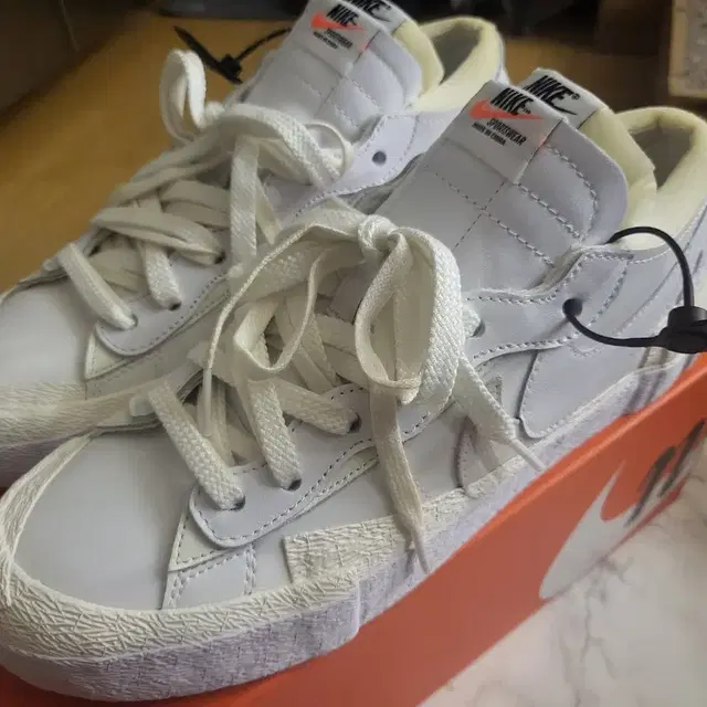 Nike x Sacai Blazer Low White Patent Lea