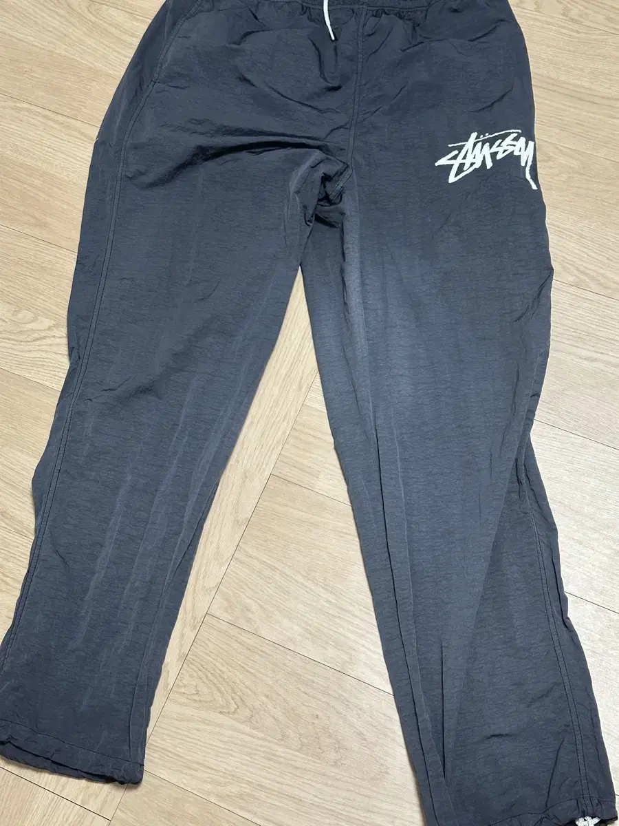 I am selling a pair of Natusi nylon pants, size M.