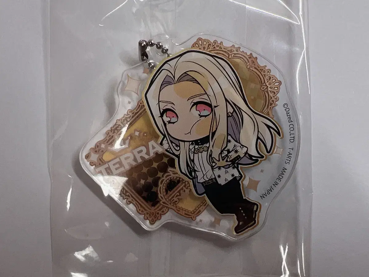 Charisma House Terra acrylic Sells keyrings, 1st Brake Chekis, and can badges.