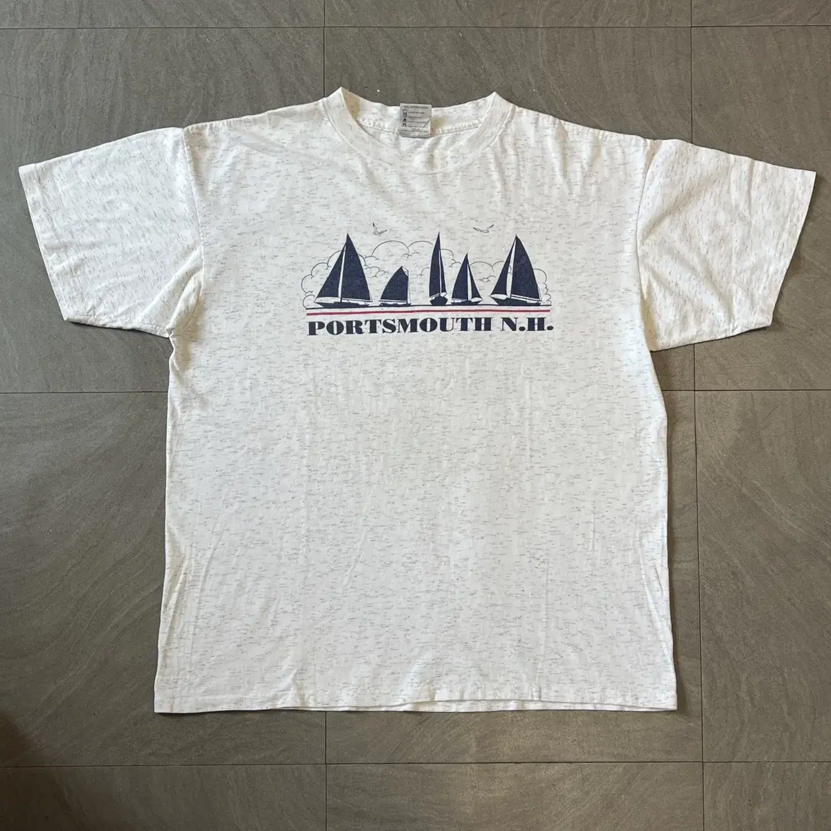 Vintage melange short sleeve t-shirt from the 90s made in the USA