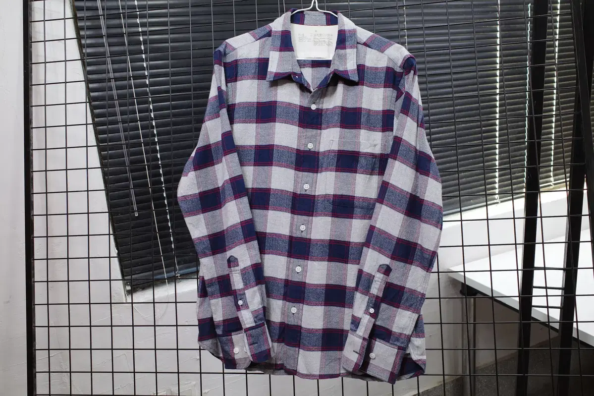 A plain check shirt,