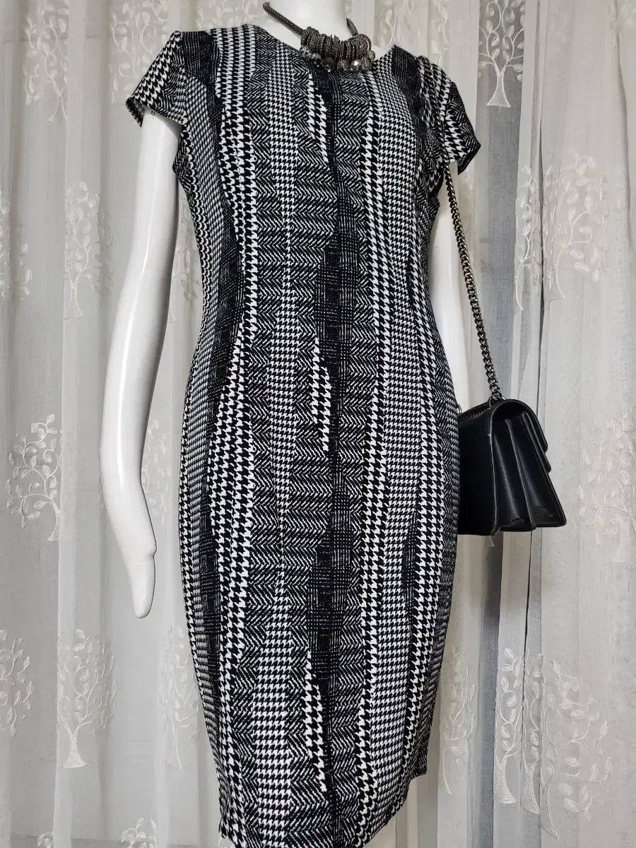 white and black patterned onepiece