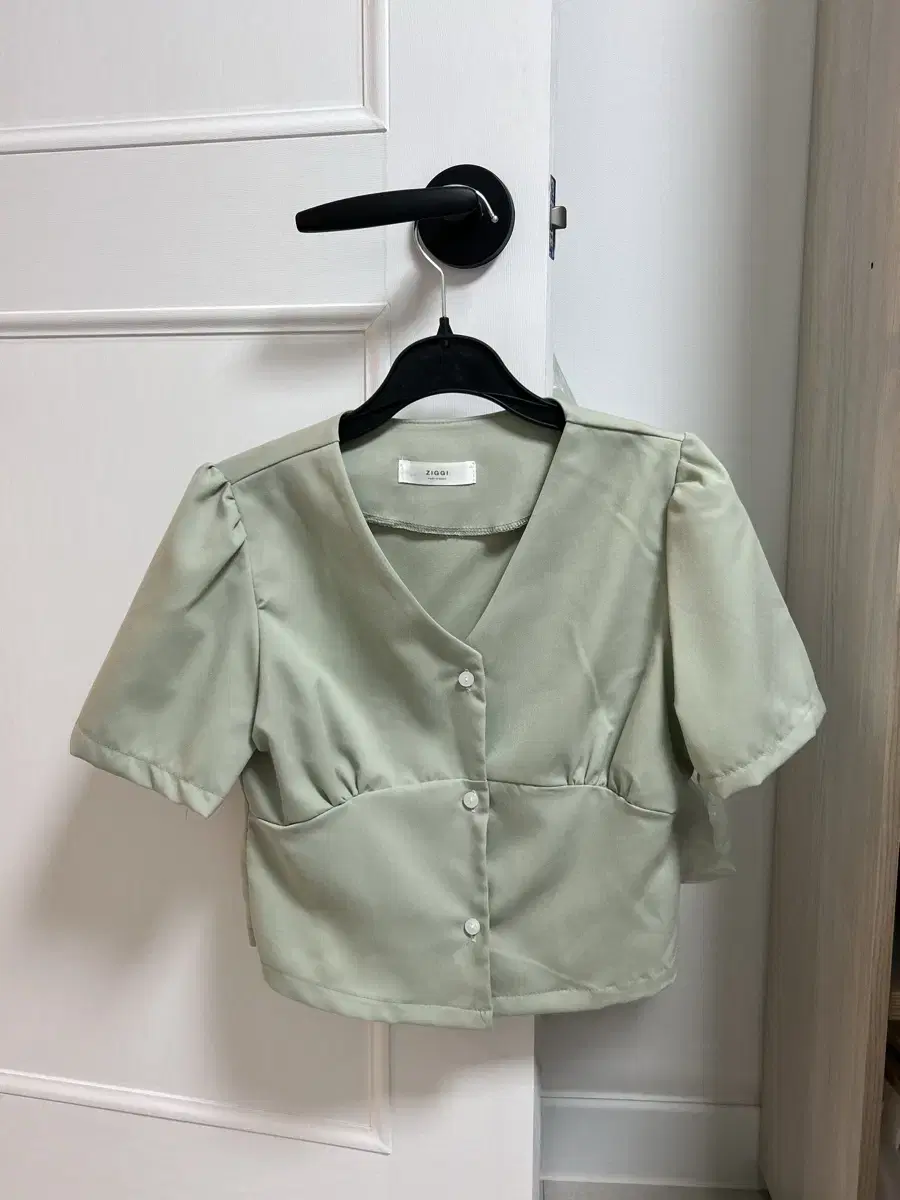 Mint short-sleeved blouse