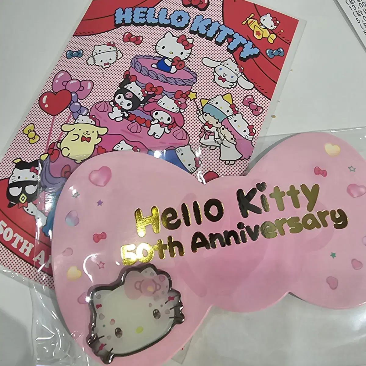 San Rio Hello Kitty 50th Anniversary pop up $50+ pre-order benefit Pin badges postcard I'm selling them.