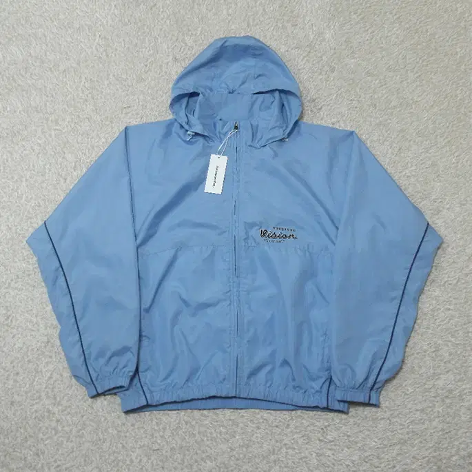 New L) This Is Never That Sample Overfit Windbreaker