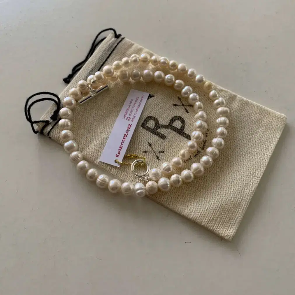 rosetta prayer pearl toggle necklace