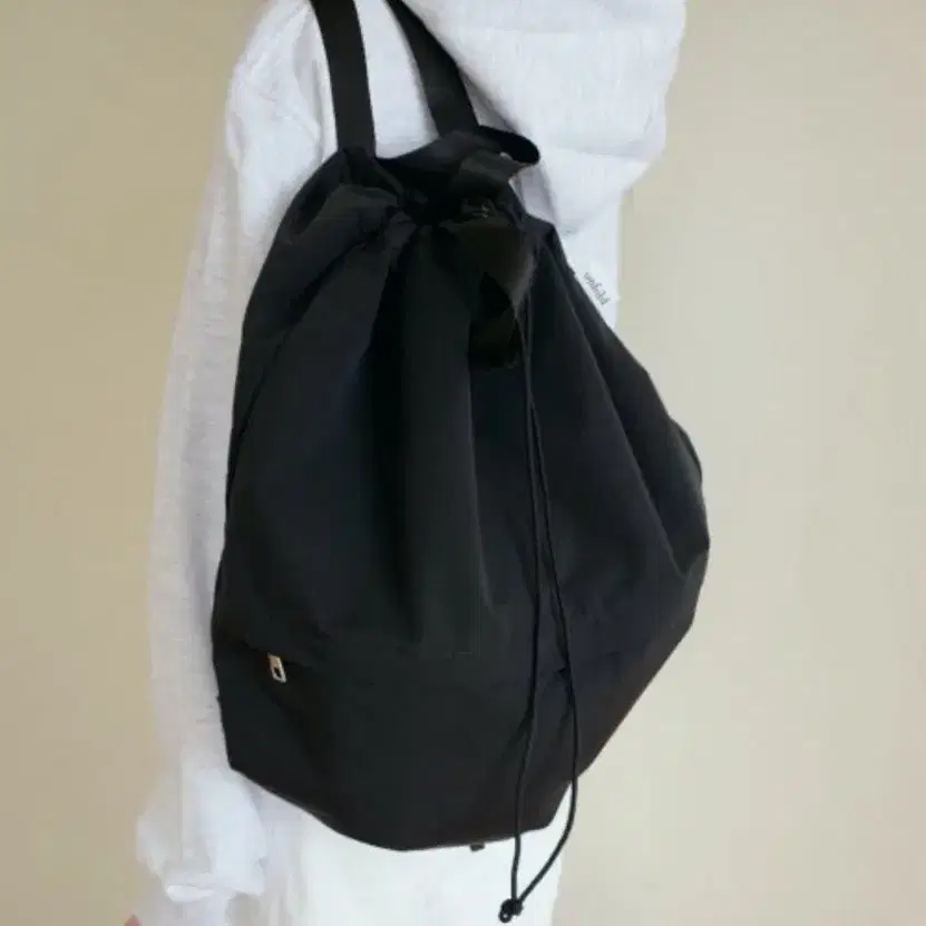 언폴드 string backpack (black)