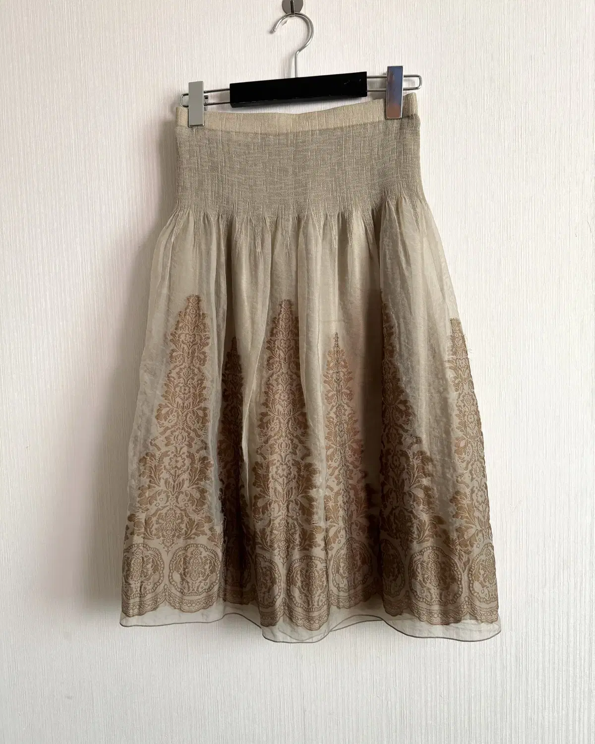 Ornament point midi skirt