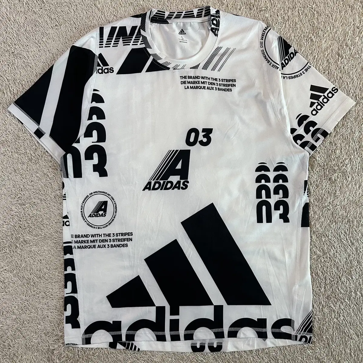 [L] 아디다스 ADIDAS AOP 모토 기능성 반팔 티셔츠