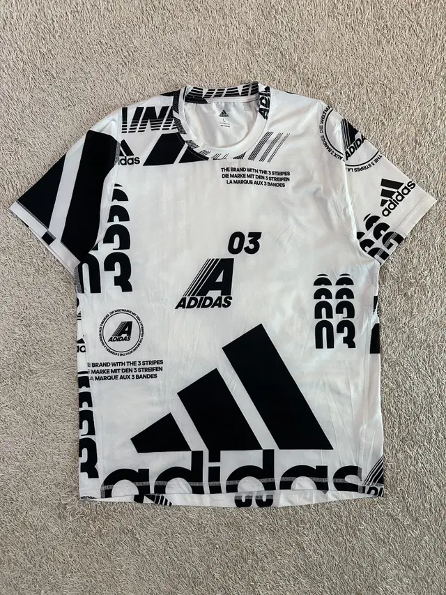 [L] 아디다스 ADIDAS AOP 모토 기능성 반팔 티셔츠