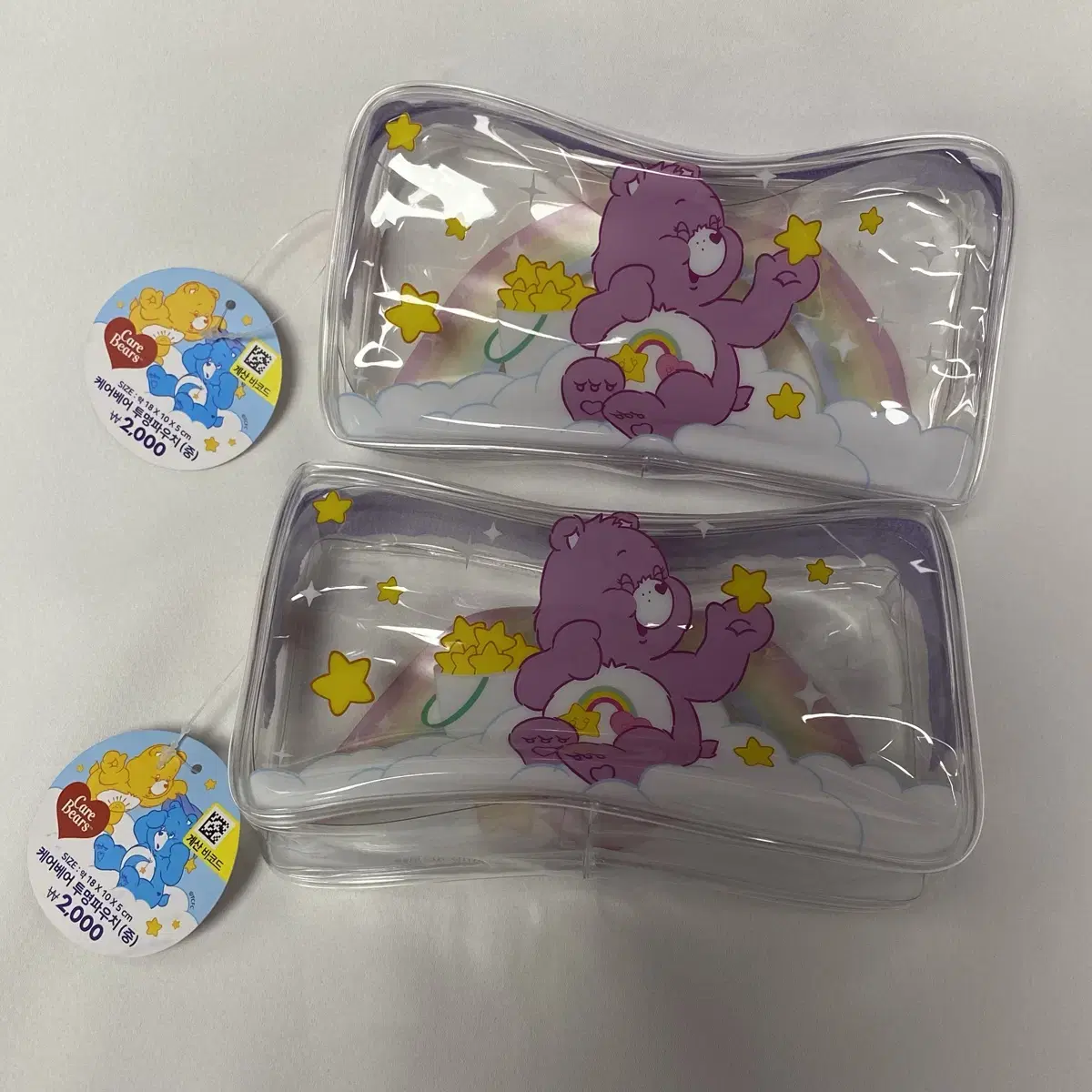 Daiso bora purple carebear pow in clear pouch