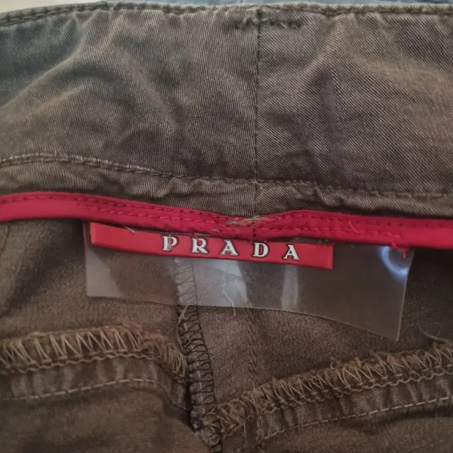 정품 프라다 여성 갈색 칠부 얇은 면 바지 prada