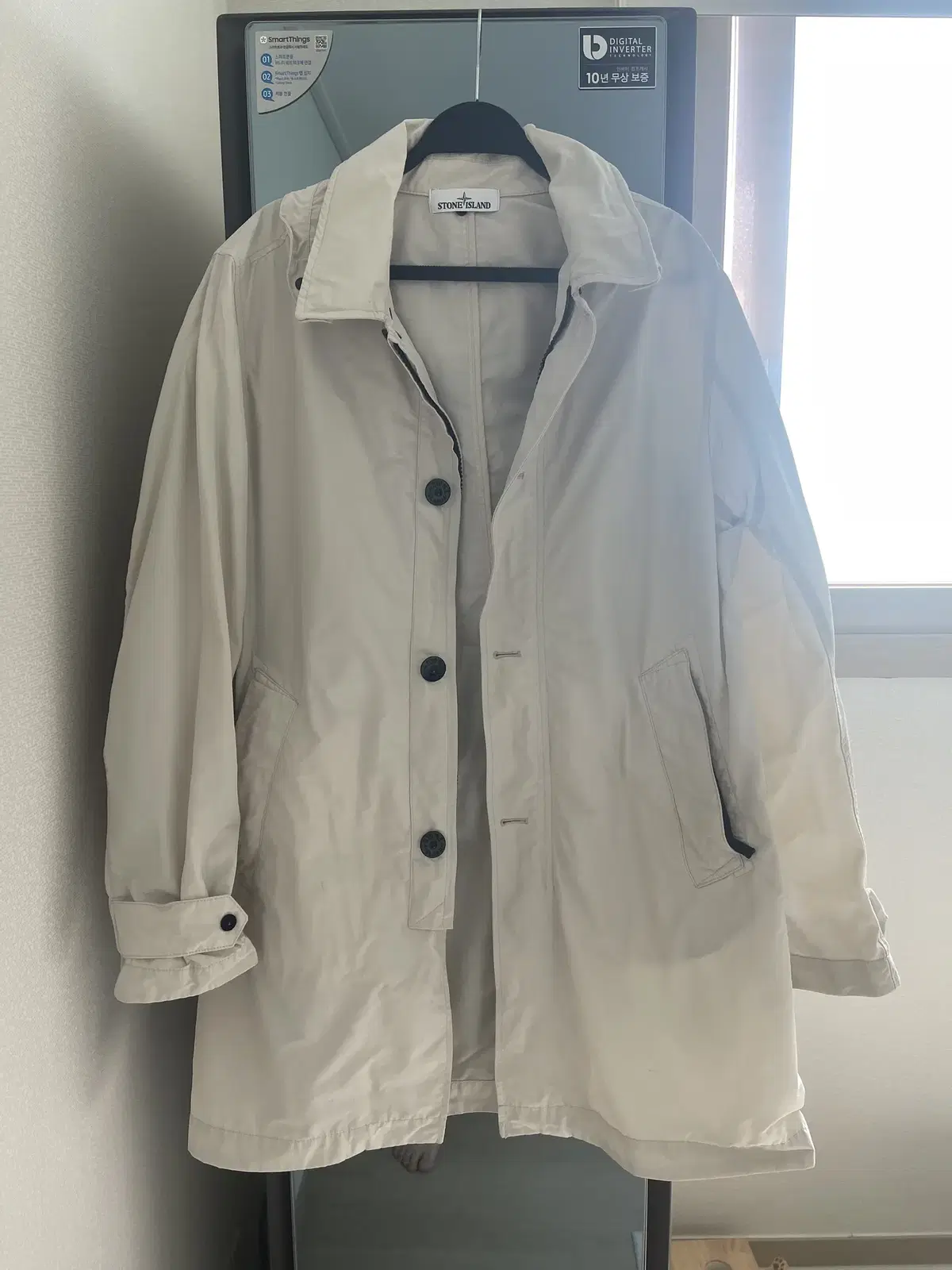 I'm selling a Stone Island microlapse trench coat in size Large.