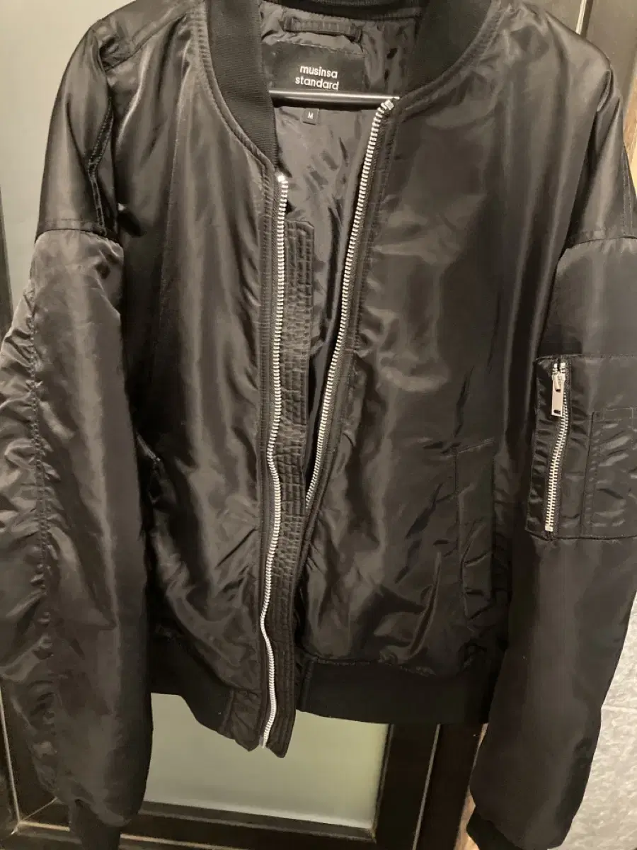 I am selling a plain MA1 jacket size M