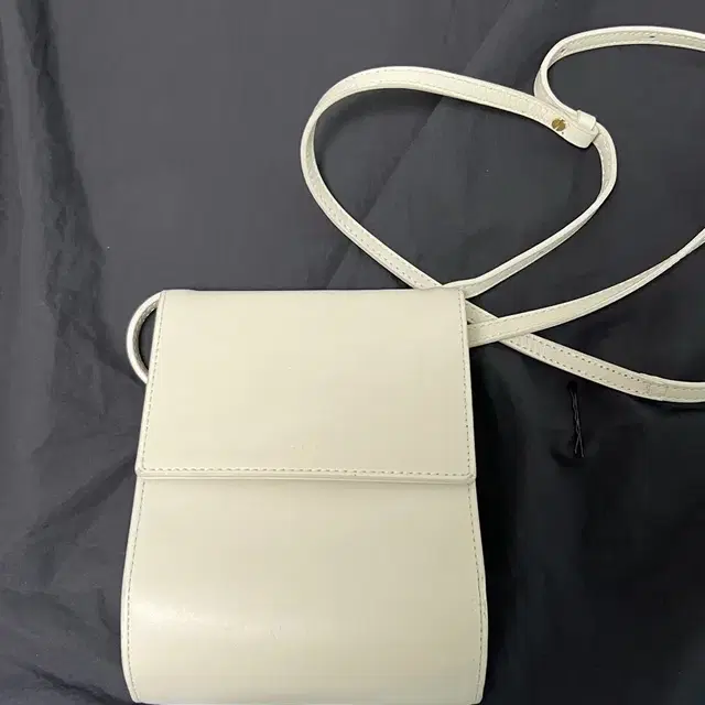 로서울 가방 Pochette crossbody bag Ivory