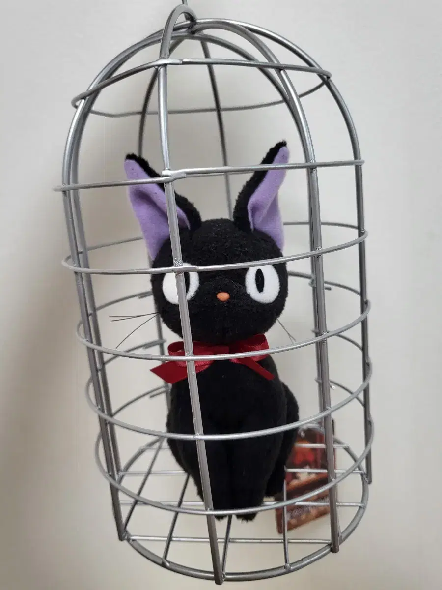 Birdcage support doll