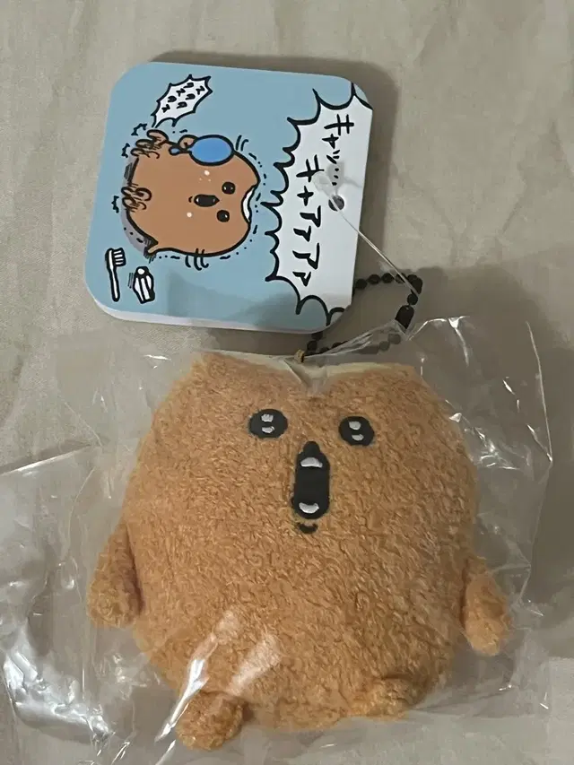 농담곰 마스코트 한입 베어먹힌 고로케