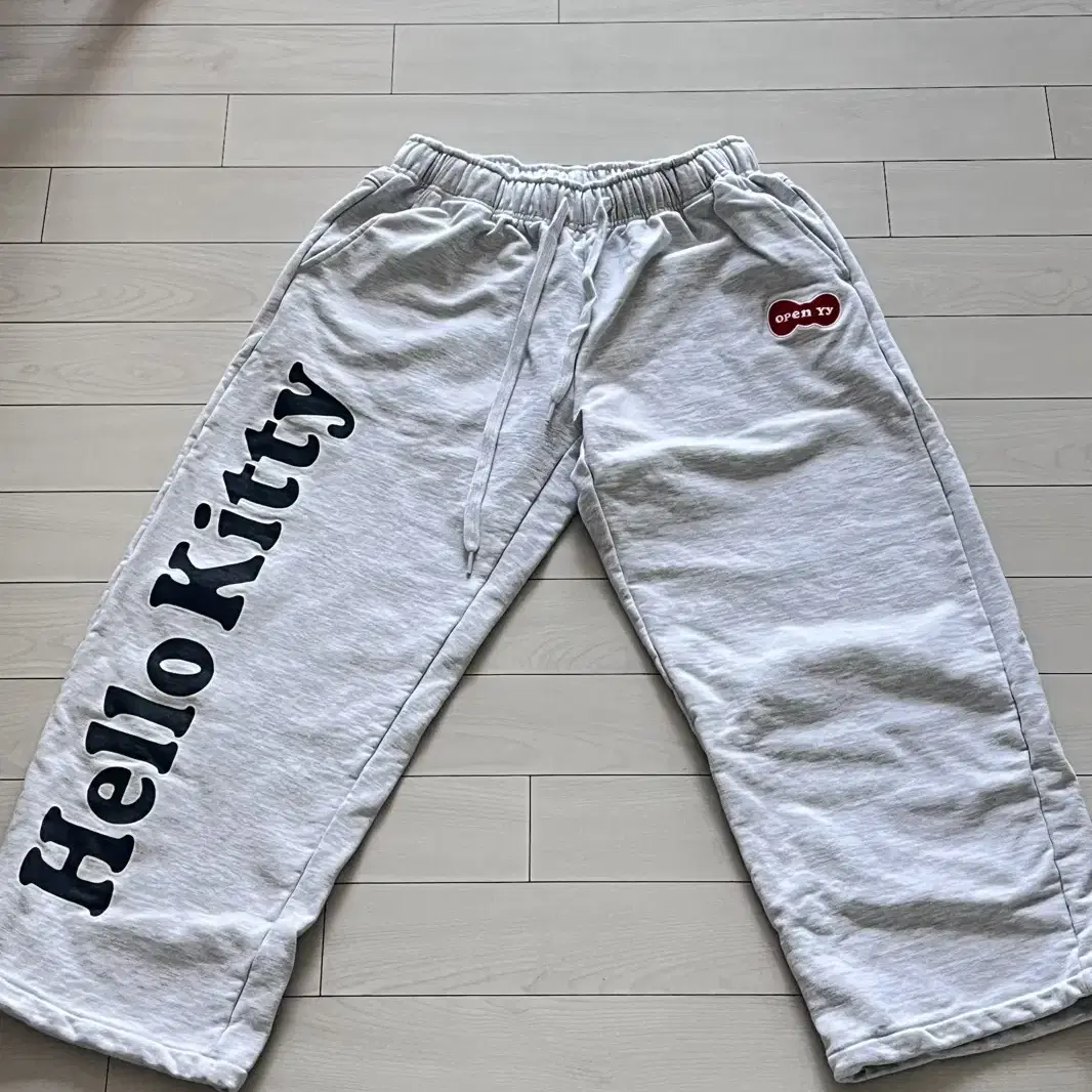 HELLO KITTY X YY ROUNDING TRACK PANTS