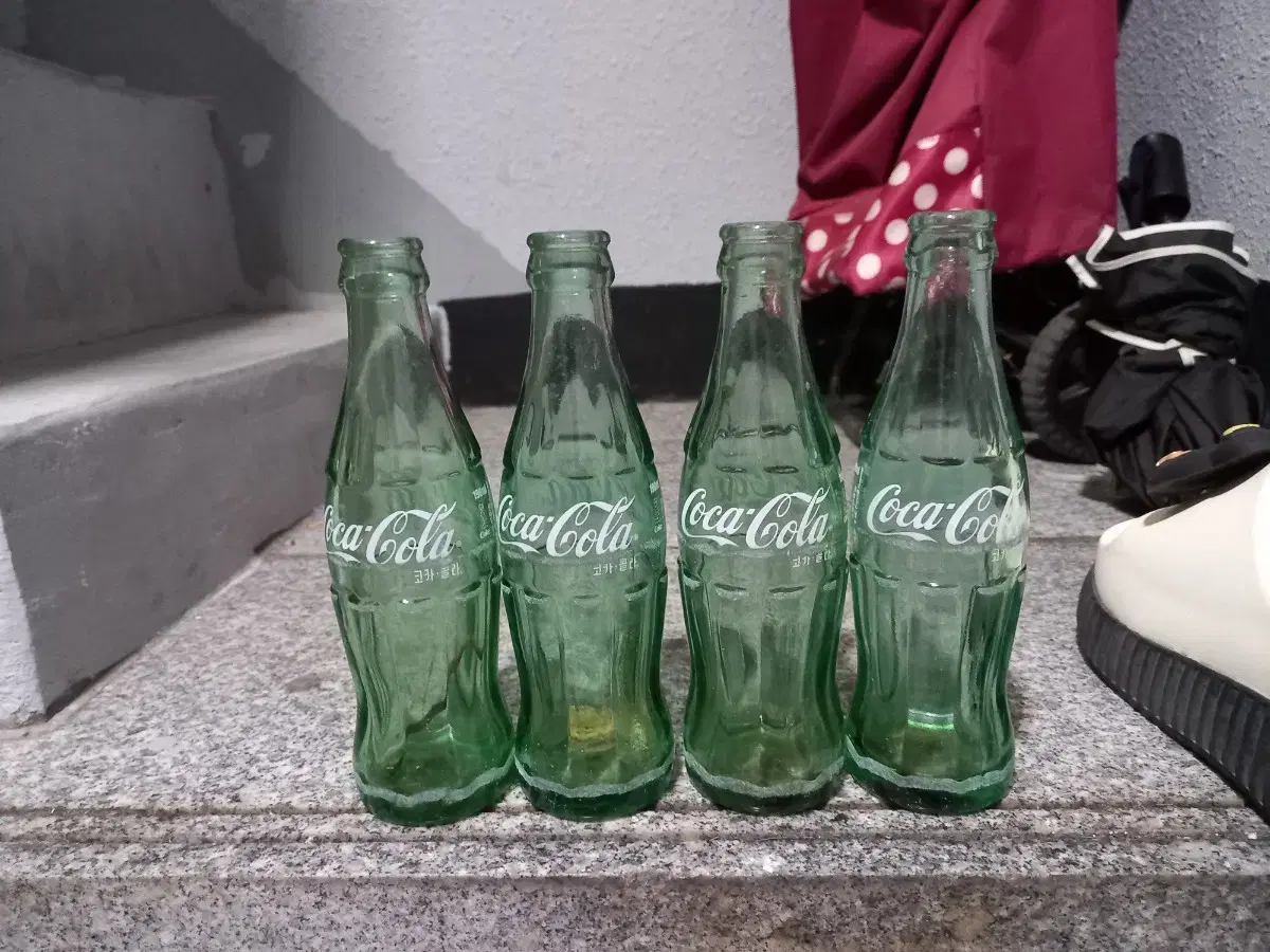 190 empty bottles of Coca-Cola