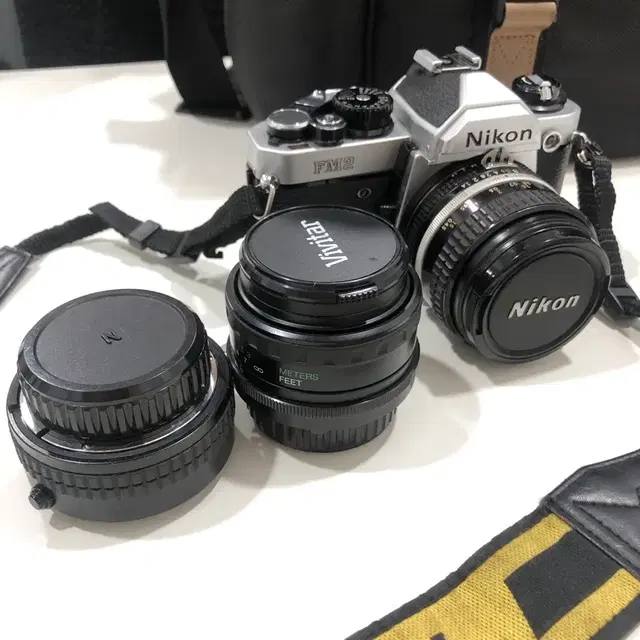 nikon FM2 +렌즈 3개 + 필름카메라 덤 1개더