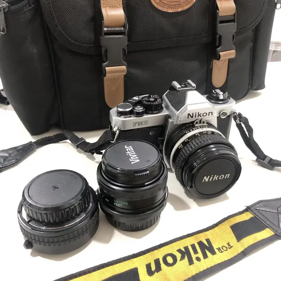 nikon FM2 +렌즈 3개 + 필름카메라 덤 1개더