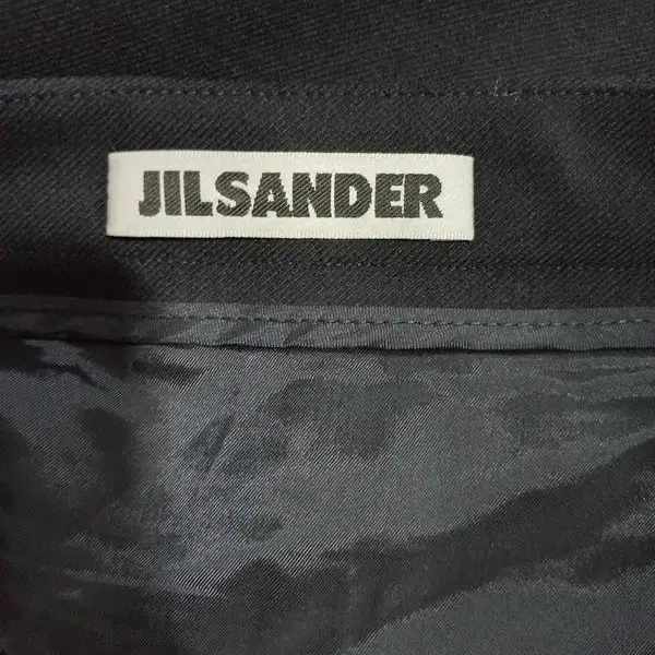 질샌더JILSANDER 오피스룩 버진울 H라인 여성 미디스커트 라벨38