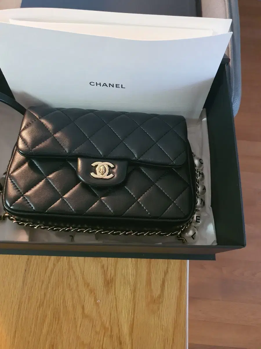 Chanel Pearl Chain Flap Bag