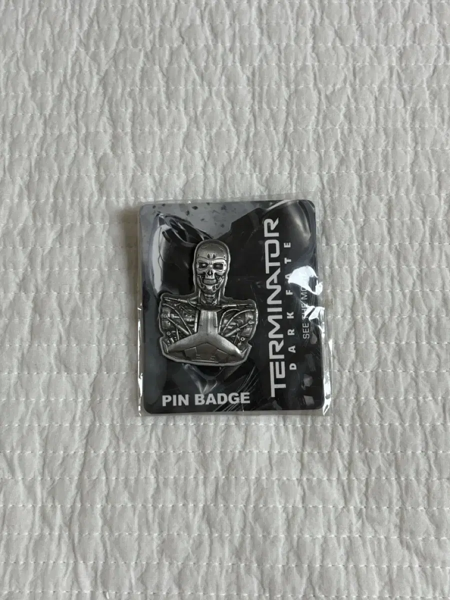 Terminator pin badge