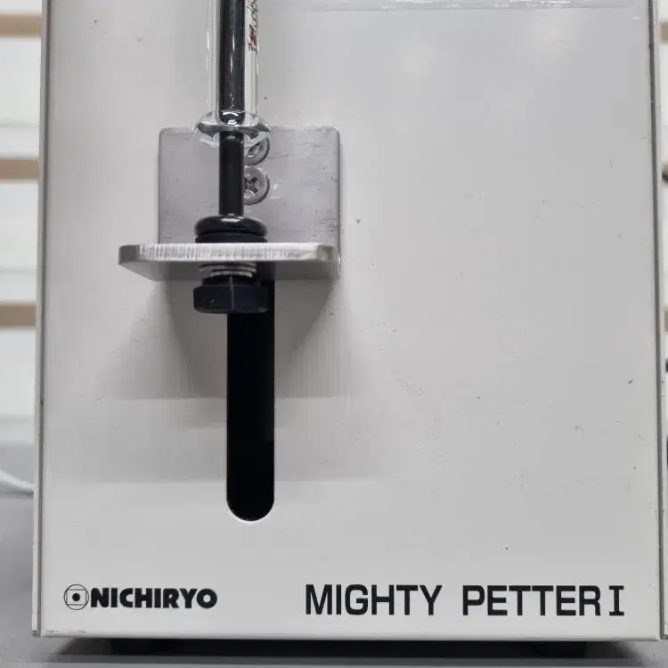 NICHIRO Mighty Petter I 간이형 자동분주기.