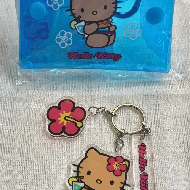 일본 avail x sanrio 태닝키티 파우치 열쇠고리