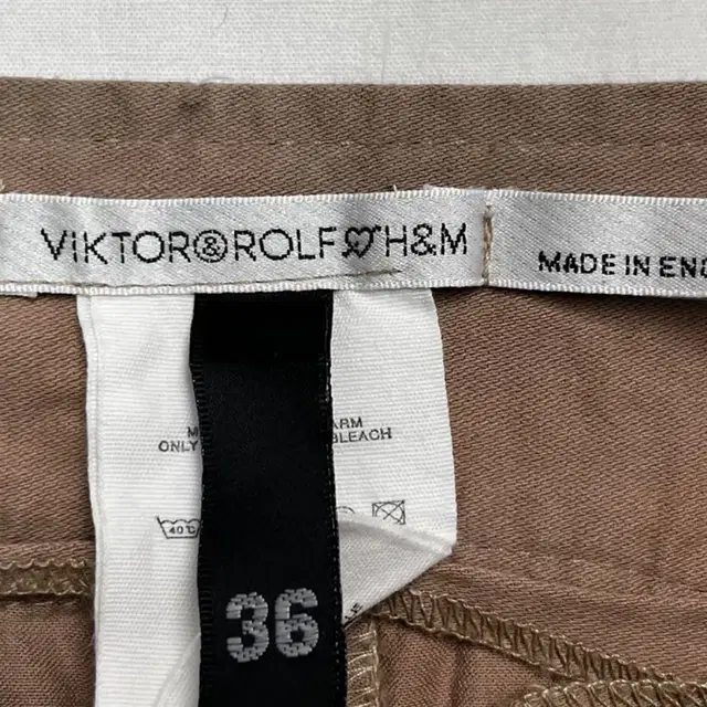 [H&M x VIKTOR&ROLF] 빅터앤롤프 포켓 플리츠 미니스커트