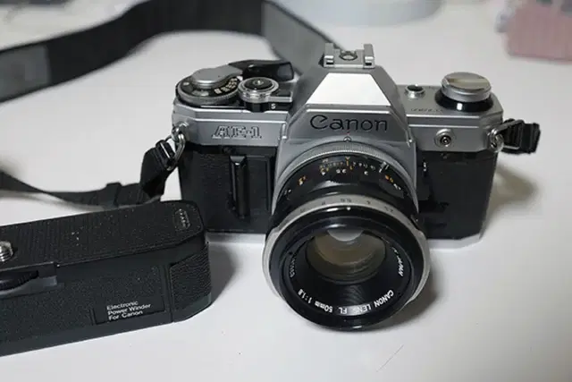 (안전결재)캐논 베스트셀러 AE-1(50mm랜즈,오토리와인더)팝니다