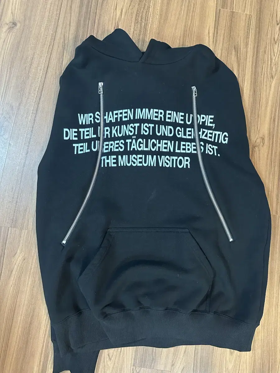TheMuseumVisitorCutoutZip Hood