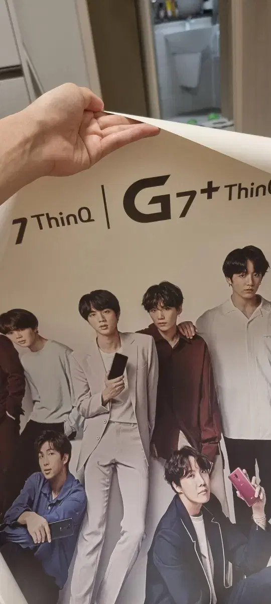 2 BTS posters with distribution tube