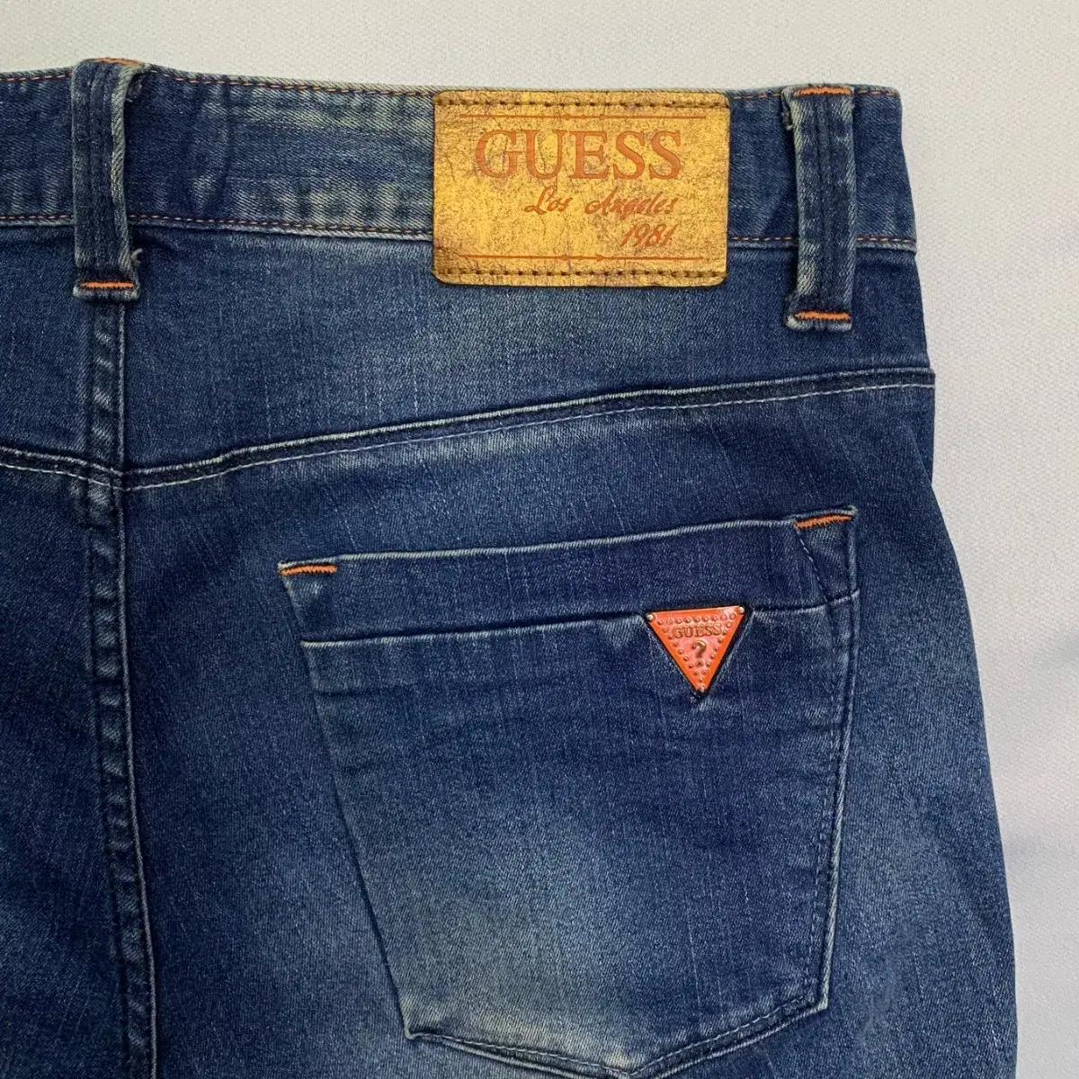 [35] Gess Orange Plate Slim Fit Denim Pants