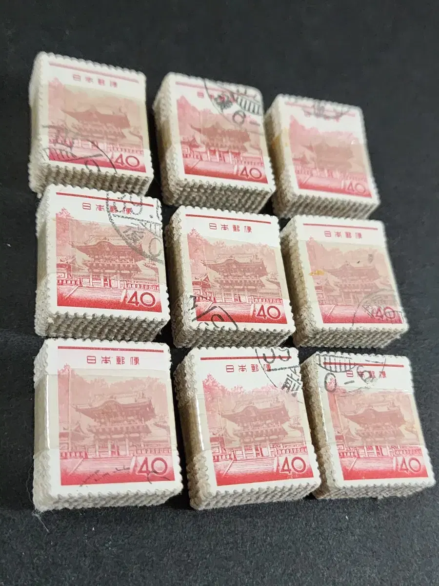 Bulk of 9 bundles of old Japanese stamps (900 sheets)