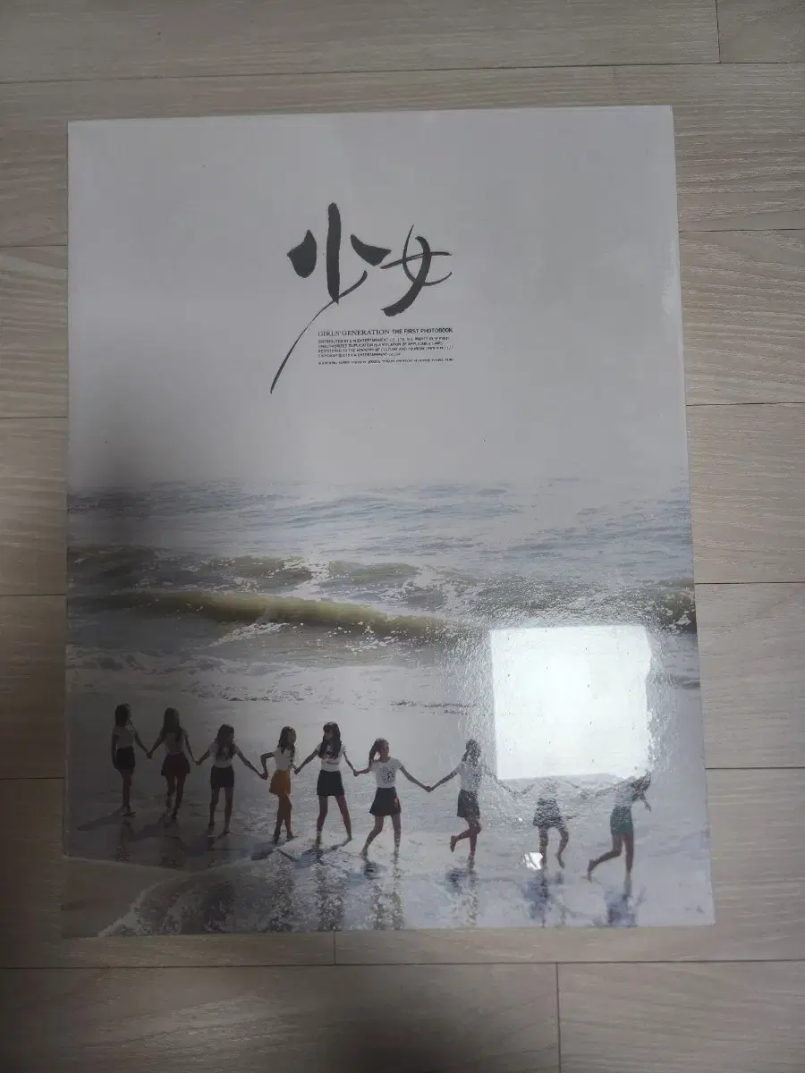 I have an unsealed girls generation photo book for sale.