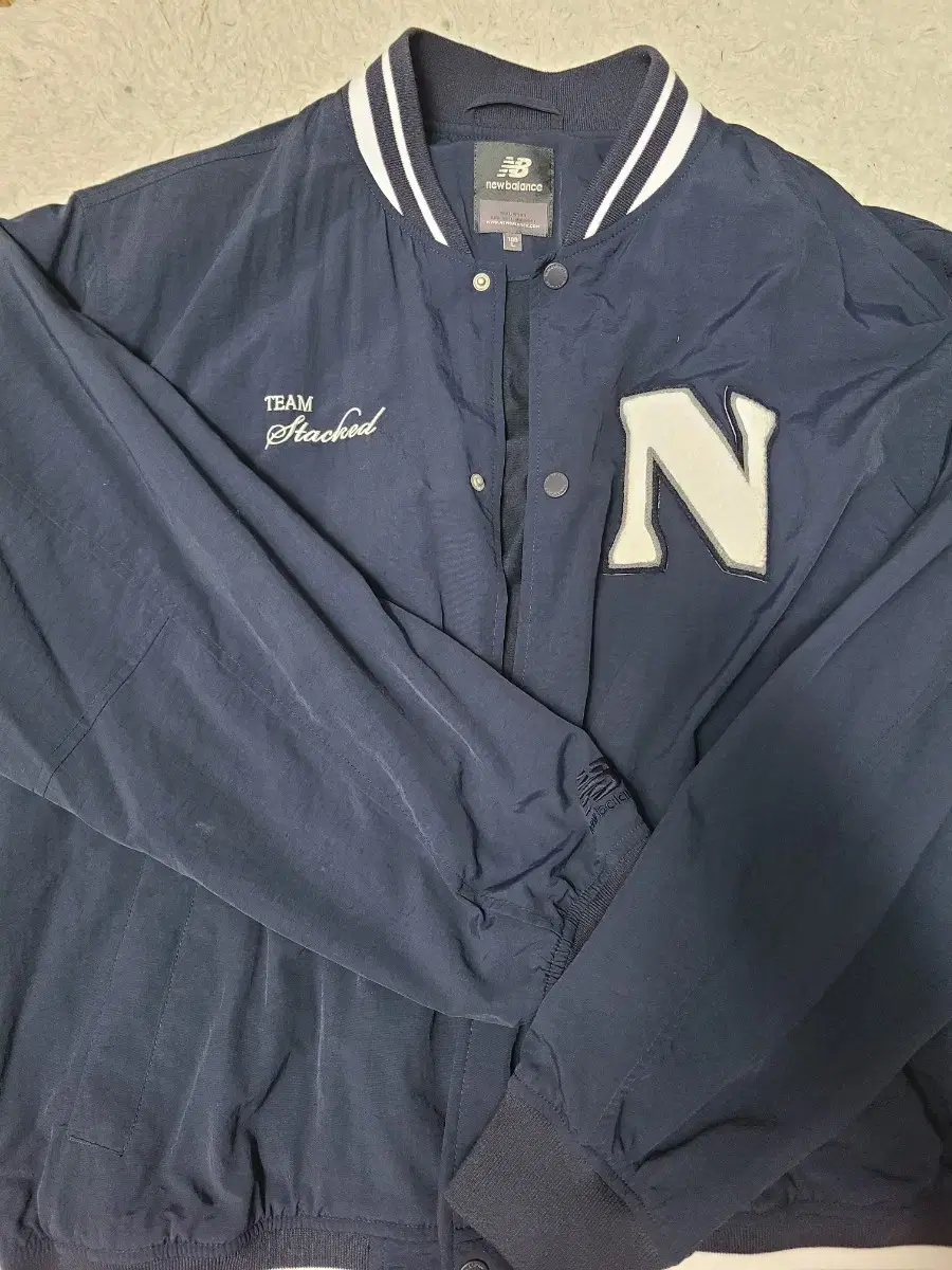 New Balance NB UNI Nylon Varsity Jacket 100 Large Navy