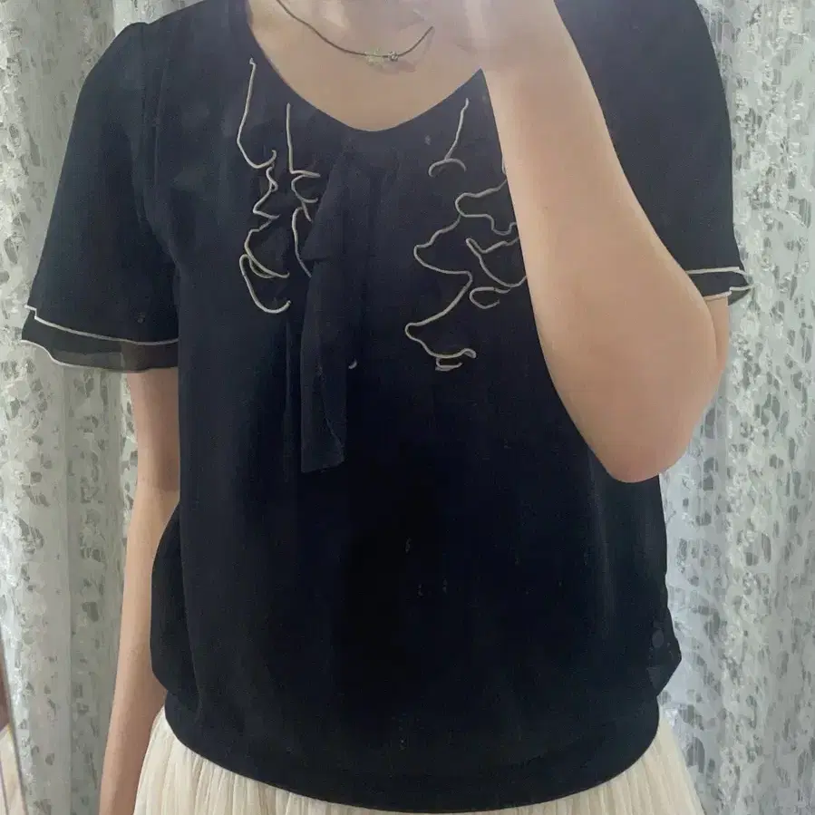 Black ruffle blouse