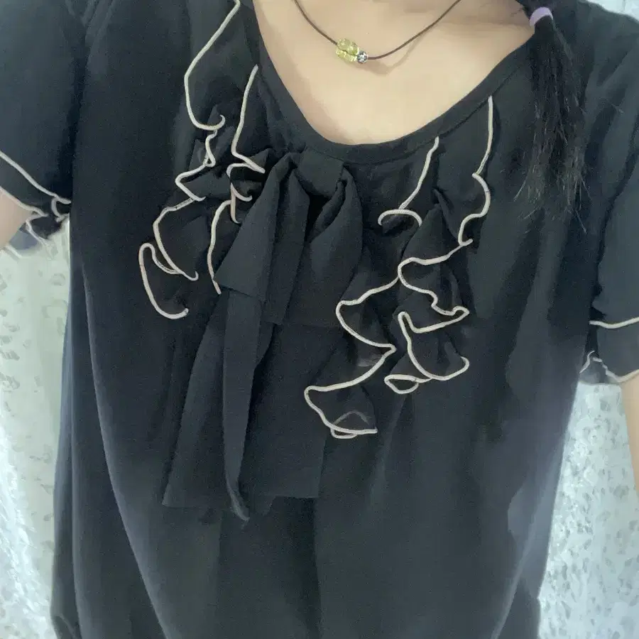 Black ruffle blouse