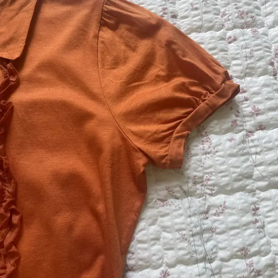 Orange ruffle shirts