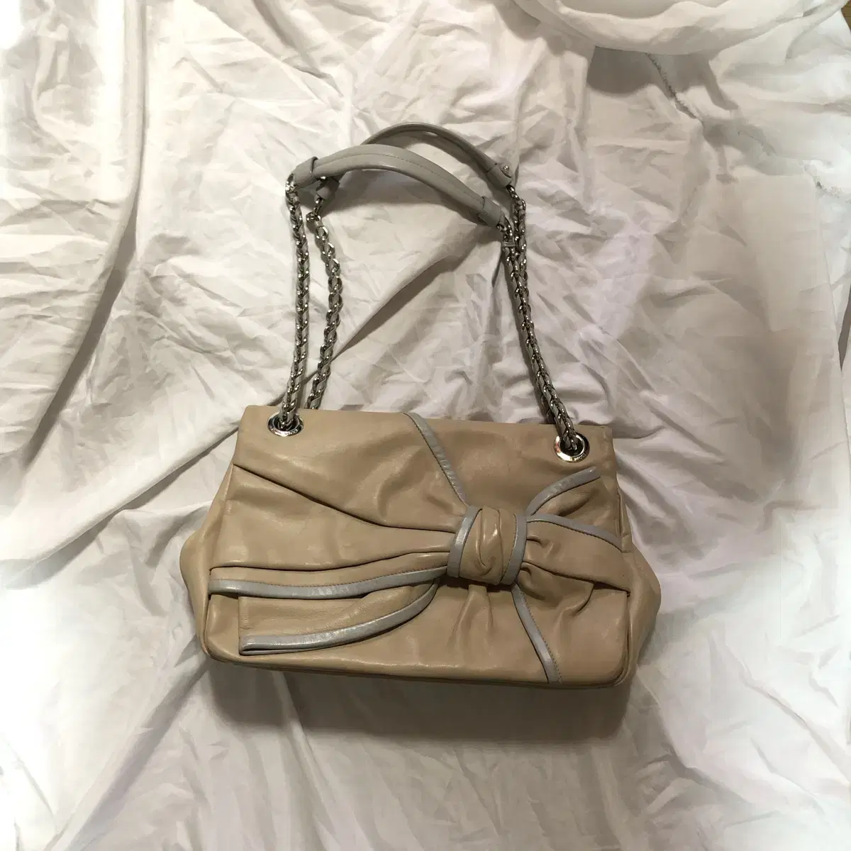 Vintage Nina ricci beige ribbon bag