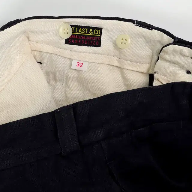 AT LAST CO BLACK DENIM TROUSERS