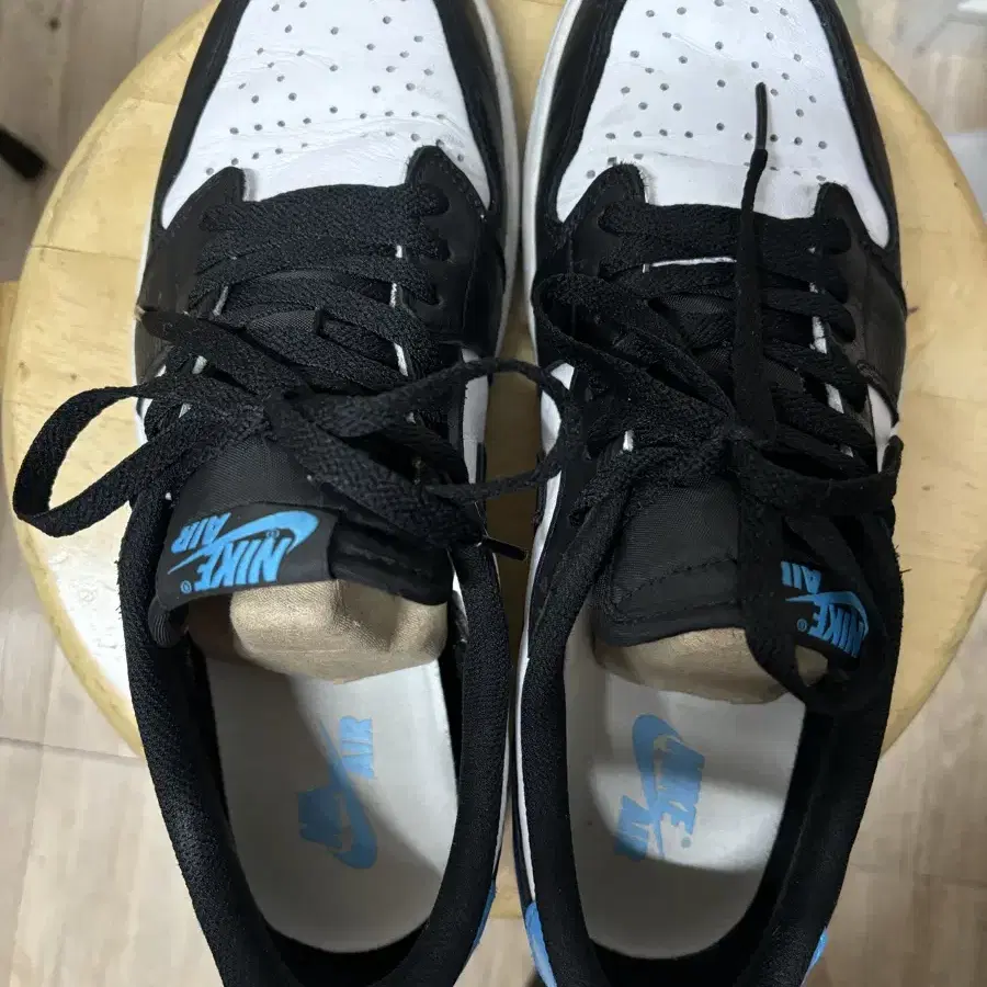 Jordan 1 Retro Low OG Black and Dark Pow