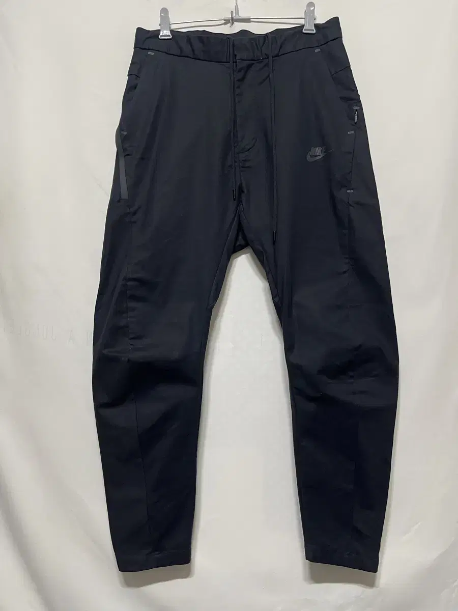 30 Nike Tech Bonded Woven Pants