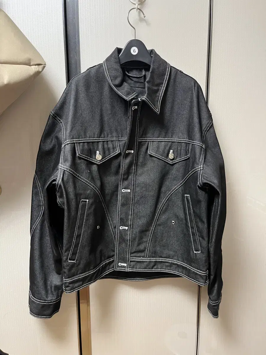 L 51 percent tunnel-lined denim jacket